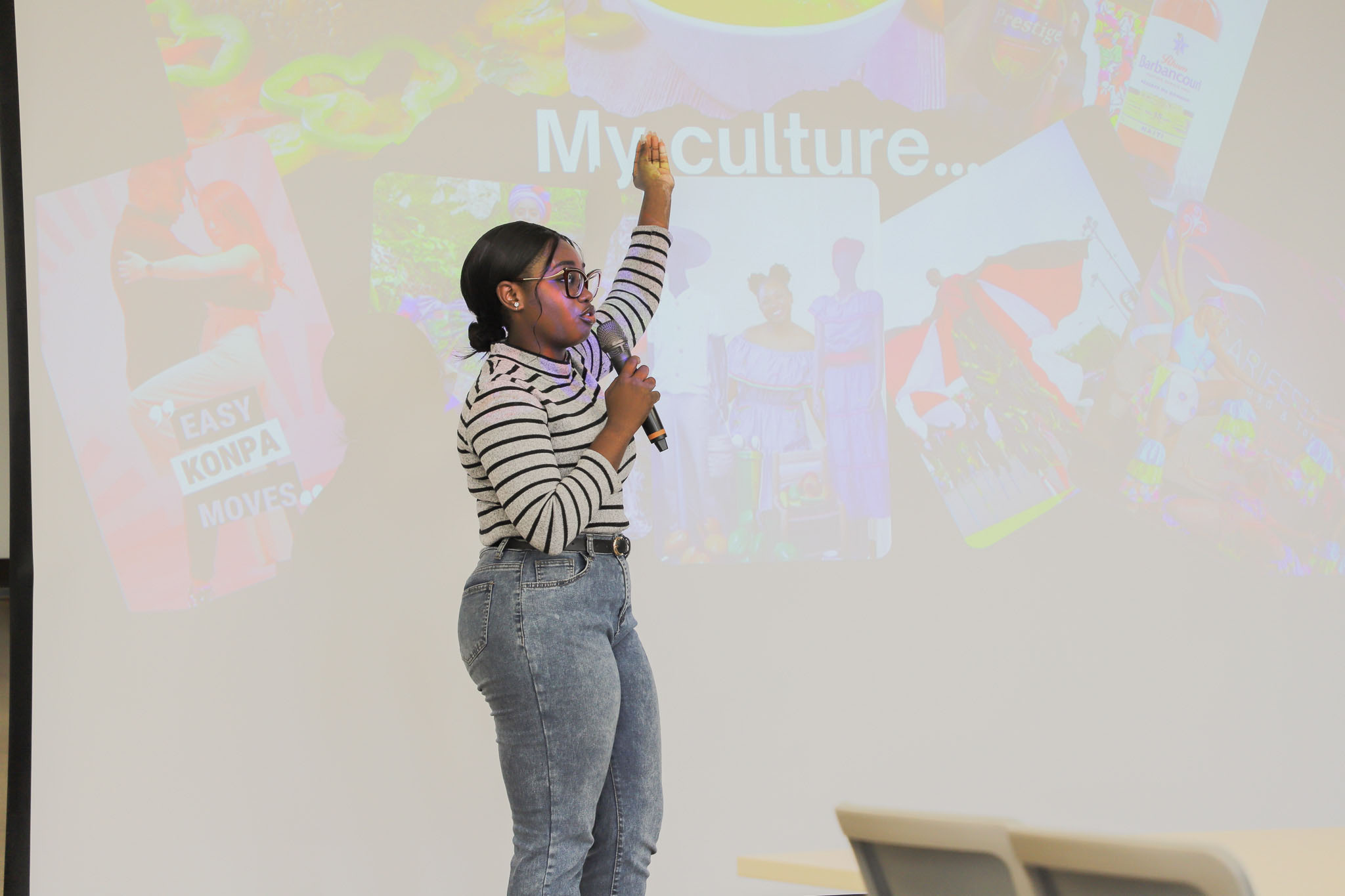 Speaker Adneissa Christy Alezy introduces the history, language, and traditional festivals of Haiti, and shares cultural differences between Haiti and Taiwan. (Photo credit: ICI)