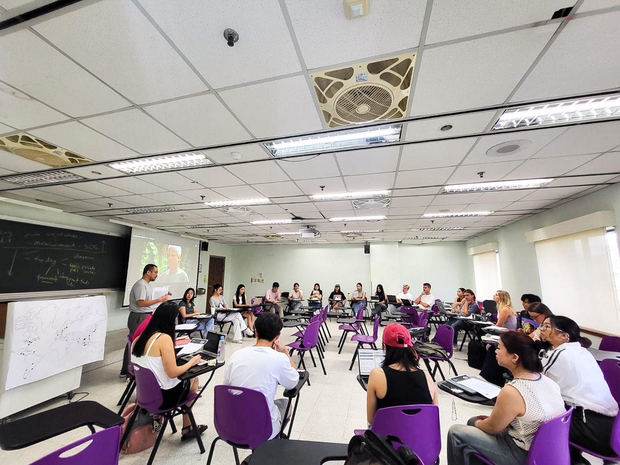 Assistant Professor Shun-Nan Chiang interacts with students during class. (Photo Credit:ICI)