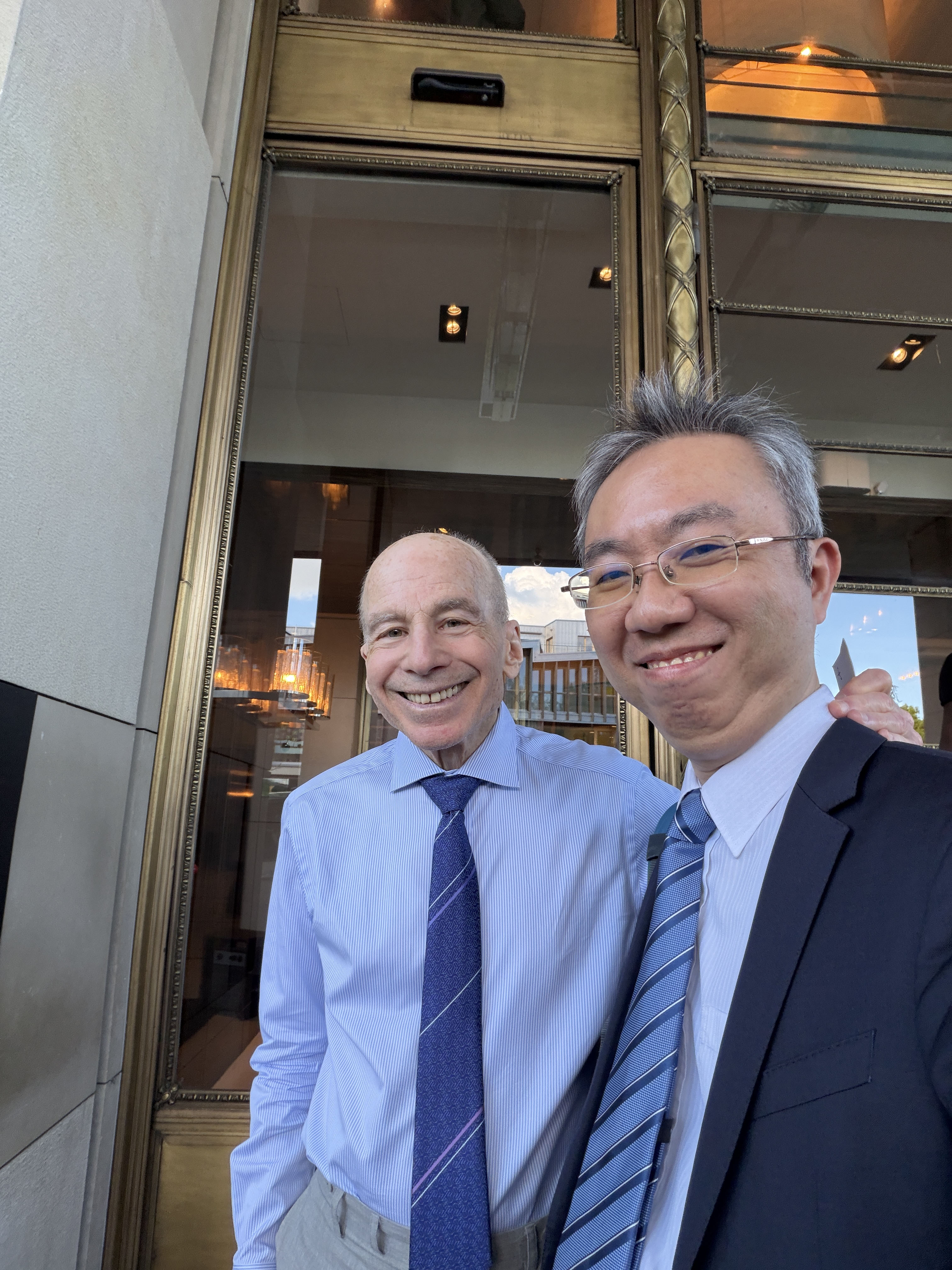 Prof. Liu (left) with his doctoral advisor, Prof. Lawrence Gostin (right) of Georgetown University, in Geneva; he was also interviewed by TaiwanPlus during the assembly. (Source: provided by Prof. Liu