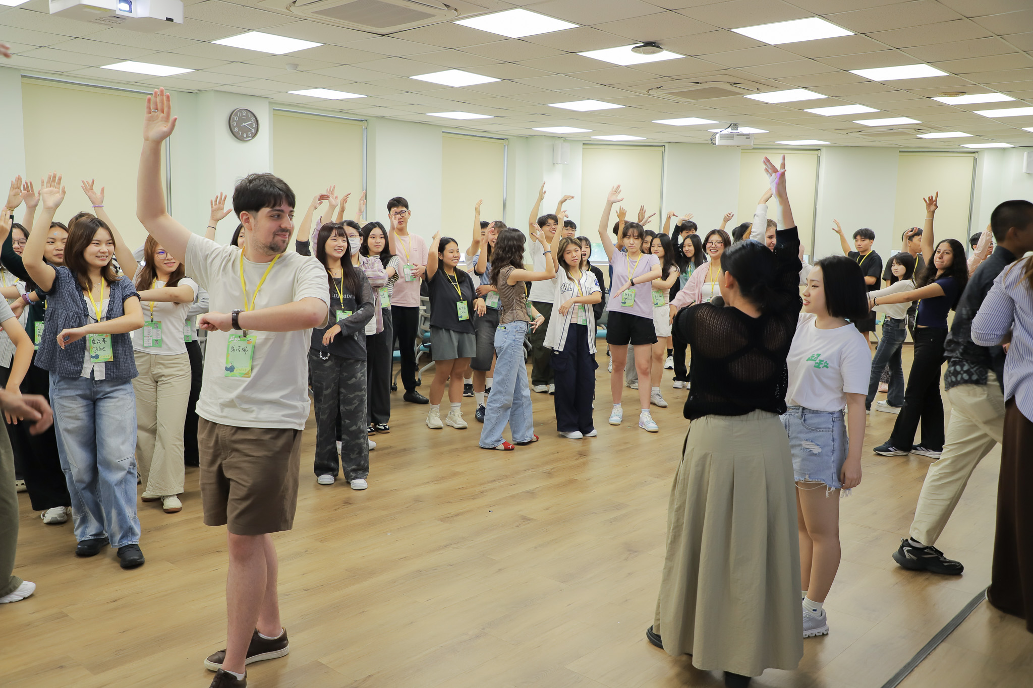 ICI’s Student Life Advisor leads an icebreaker activity and invites new students to take on ICI’s “first dance”—Flamenco. (Photo courtesy of ICI)