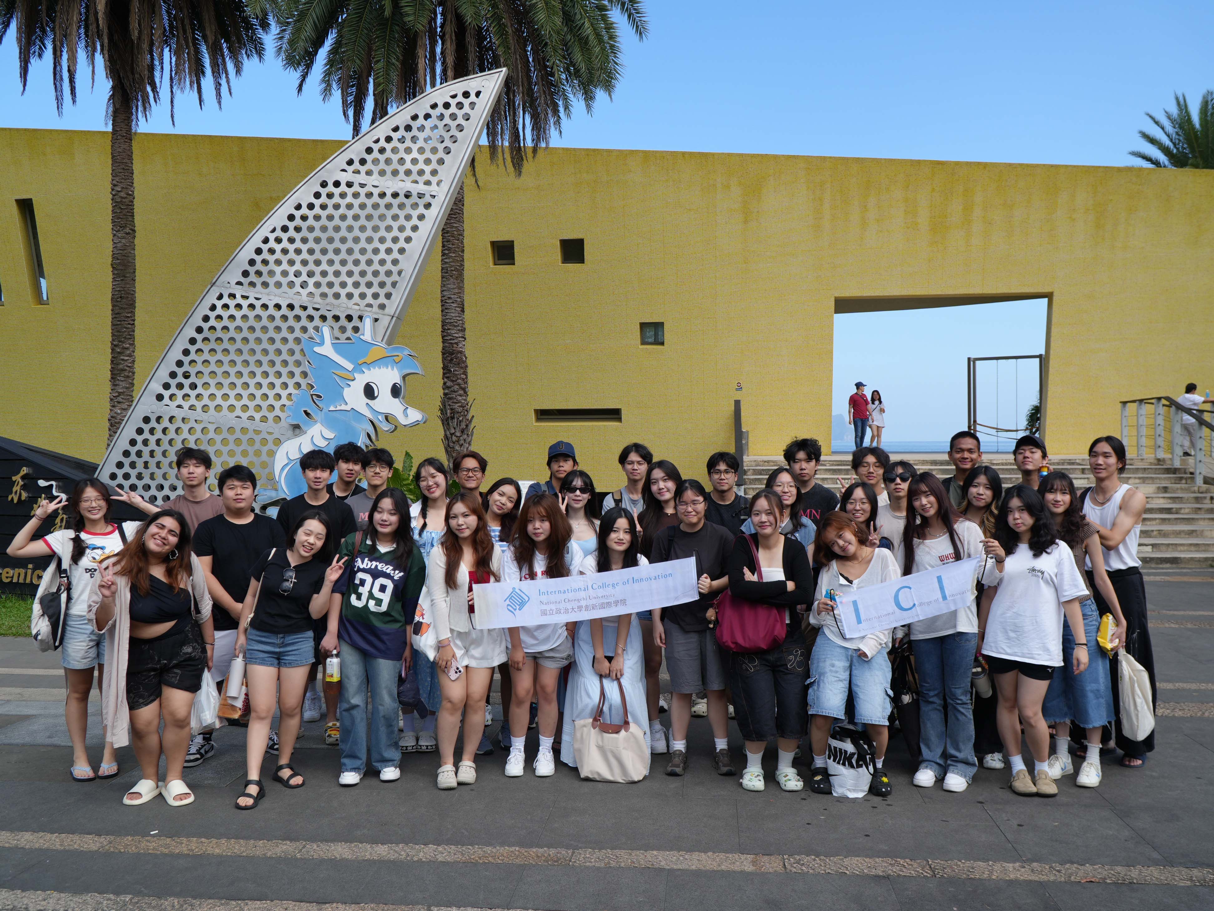 ICI students pose for a group photo at Waiao Beach in Yilan, capturing a memorable moment from their two-day, one-night camping trip. (Photo courtesy of ICISA)